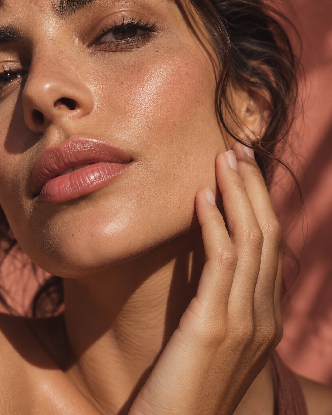 Beauty editorial portrait with natural skin texture; illustrative model