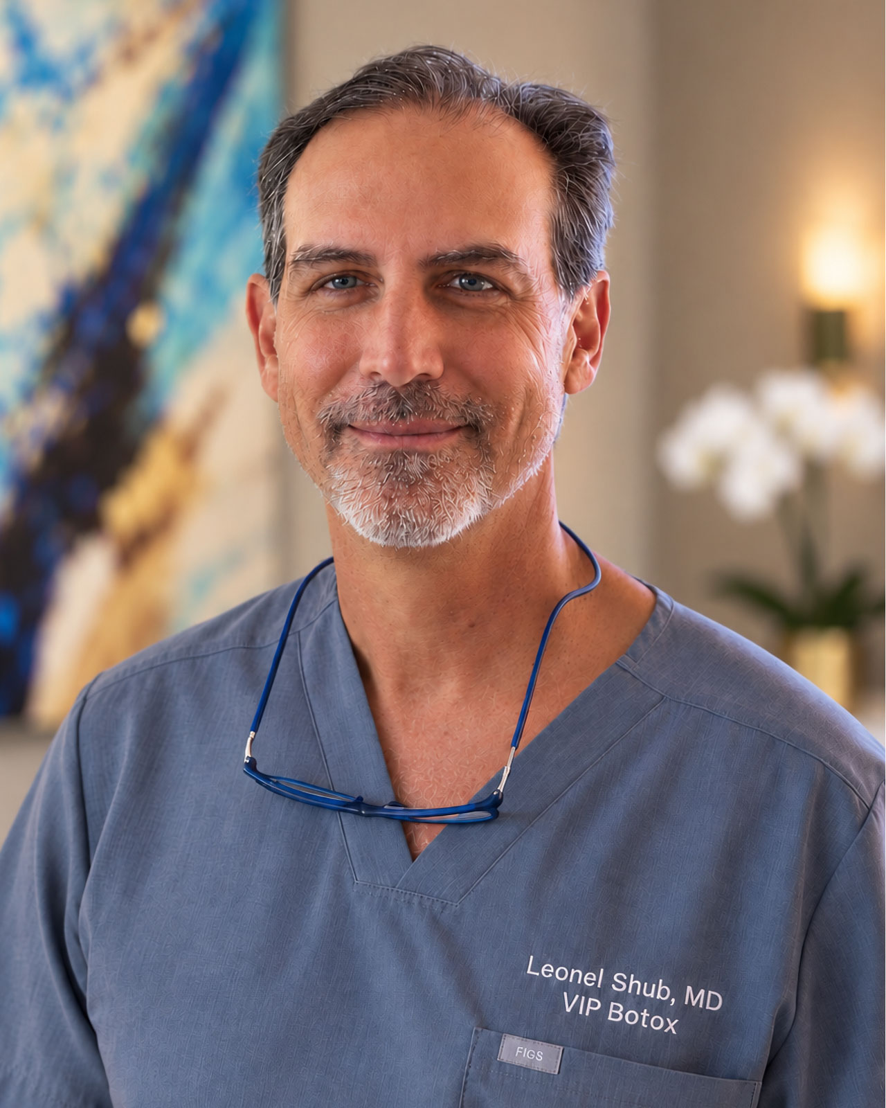 Dr. Leonel Shub in gray medical scrubs